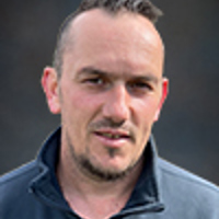 Anton Kuzhnini, personal i Grevie