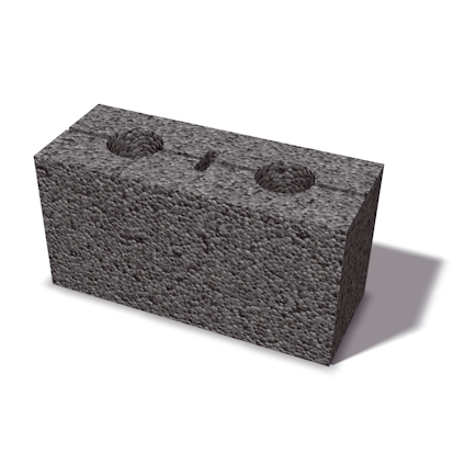 Grått betongblock med två runda hål på ovansidan, frilagt mot vit bakgrund.