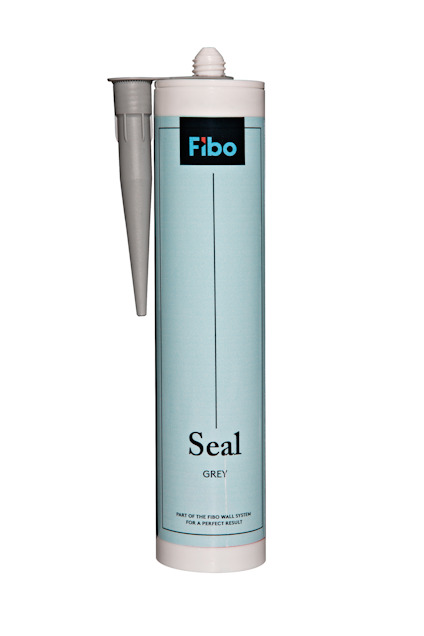 Kassett med fogmassa i grå färg, märkt "Fibo Seal Grey", med en vit applikator.