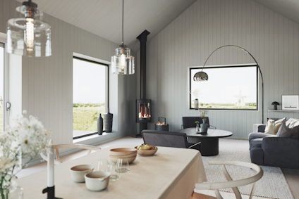 Ljust modernt vardagsrum med stora fönster, grå soffa, eldstad, bord och hängande lampor. Växter på bordet.