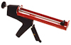 Fogpistol med röd och svart design, handtag och avtryckare.