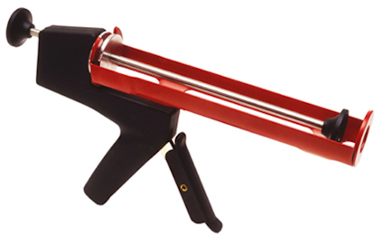 Fogpistol med röd och svart design, handtag och avtryckare.