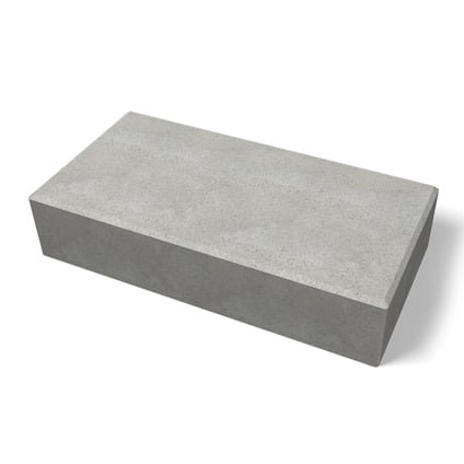 Rektangulär grå betongblock med en slät yta.