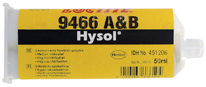 En dubbelpatron med gul etikett märkt "Loctite 9466 A&B Hysol" och detaljerad produktinformation.
