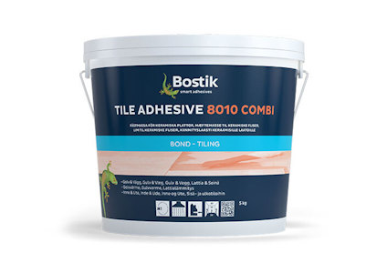 Vit plasthink med texten "Bostik Tile Adhesive 8010 Combi" och illustrationsdetaljer.