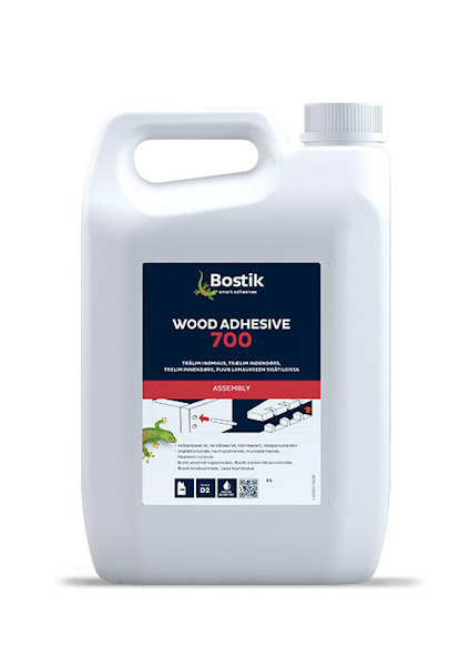 Vit plastbehållare med etiketten "Bostik Wood Adhesive 700".