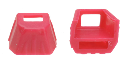 Två rosa plastföremål med fyrkantiga öppningar, placerade bredvid varandra.