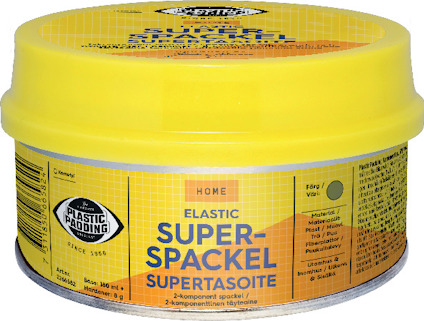 Gul burk med etiketttext: "Elastic Super-Spackel". Text i flera språk och produktinformation synlig.