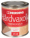 Burk med röd etikett märkt "HERDINS Hårdvaxolja", "207 Rökt ek", "275 ml".