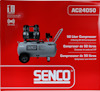 Röd förpackning med texten "SENCO" och bild på en kompressor. Specifikationer: 50 liter, 2 HP, oljefri.