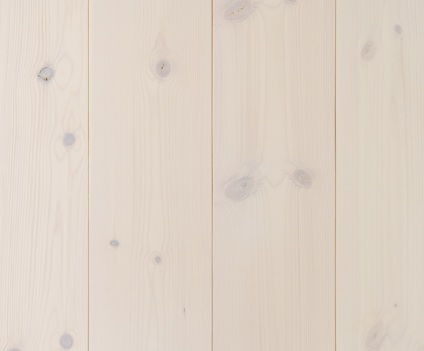 Ljusa träplankor med synliga kvistar och ådring i ett horisontellt mönster.