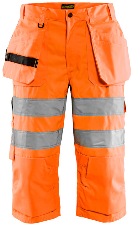 Orange piratbyxor i slitstarkt material med reflexdetaljer och flera fickor.