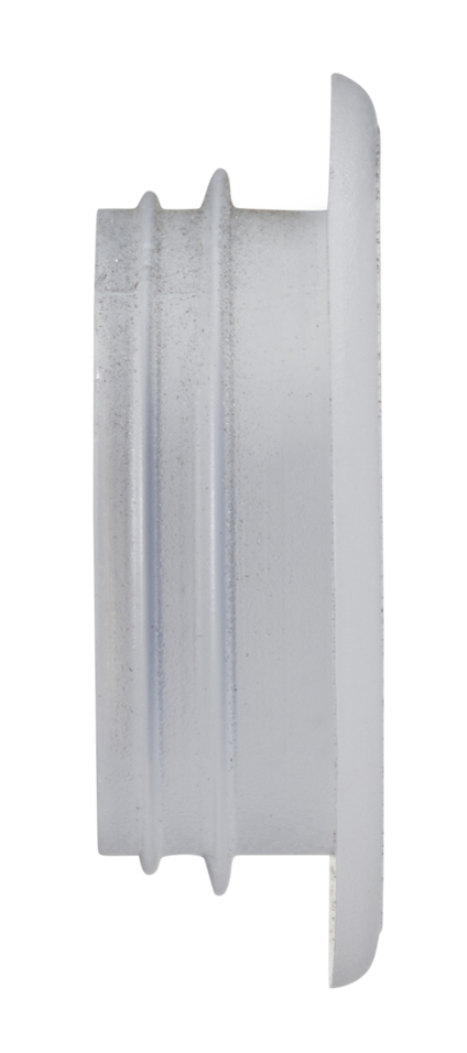 Transparent plastlock med en rund, platt yta och ribbad kant, sedd från sidan.