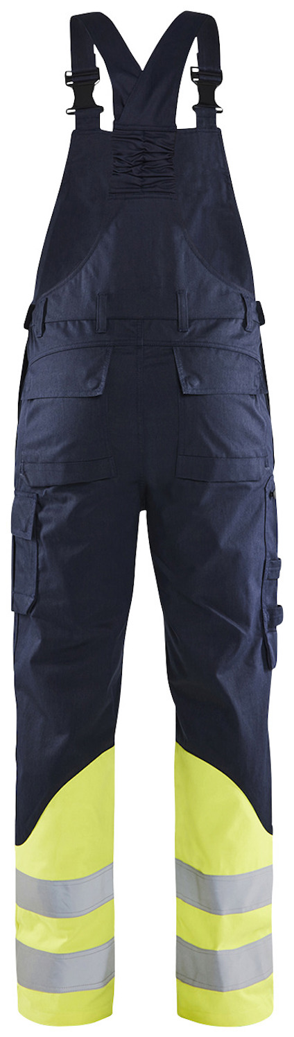 Arbetsbyxa med hängslen i svart och gult med reflexband på benen.