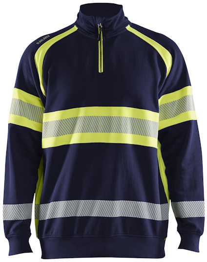 Mörkblå och varselgul sweatshirt med reflexband och blixtlås i halsen.
