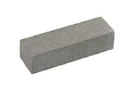 Rektangulär, grå fläcksuddare av grovt material.