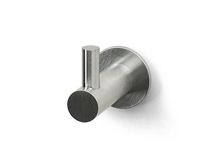 Väggmonterad kromkrok med rund bas och cylindrisk design.