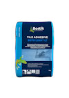 Blå förpackning med texten "Bostik TILE ADHESIVE 8070 LIGHT LT" och en illustration av en gecko.