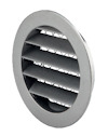 Rund ventilationsgaller i metall med horisontella lameller och perforerad bakgrund.