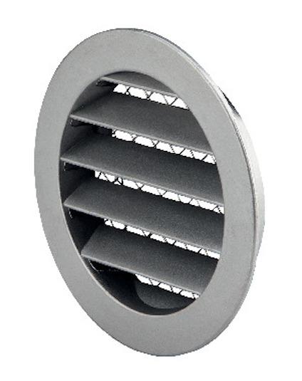 Rund ventilationsgaller i metall med horisontella lameller och perforerad bakgrund.