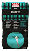 Påsen har texten "Casco HusFix Wall" med en illustration av en spackelspatel och en uppsprucken vägg.