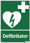 Grön skylt med vit symbol av ett hjärta och blixt samt texten "Defibrillator".
