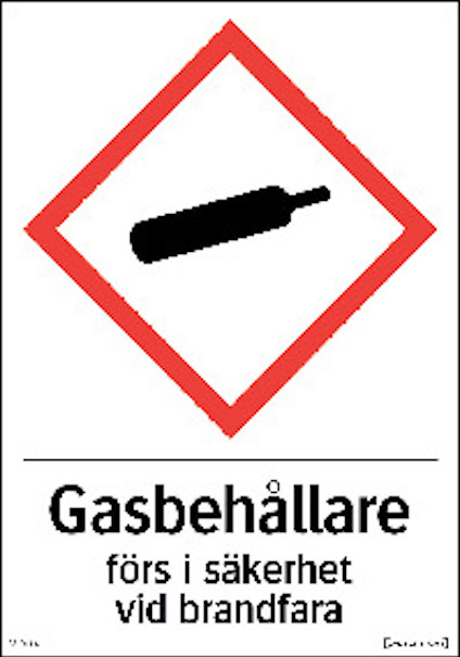 Vit skylt med röd ram och symbol för gasflaska. Text: "Gasbehållare förs i säkerhet vid brandfara".