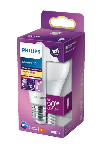 Lila förpackning med två vita LED-glödlampor från Philips, märkta med "Sensor LED" och "Warm White 2700K".