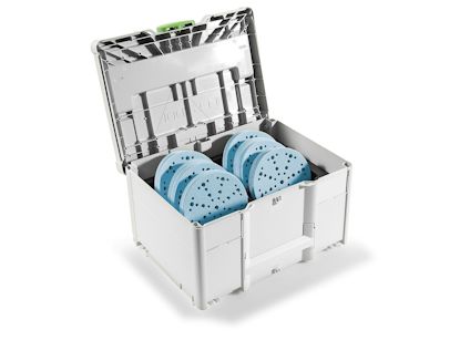 Öppen låda med blå sliprondeller i separata fack, omgiven av grått plastmaterial.
