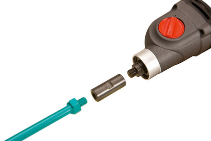 Adapter med gänga och koppling placerad mellan en blå stång och en mörk, maskinsliknande enhet med röd knapp.