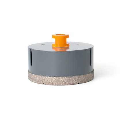 Grå diamantborr med orange fäste och glittrande borrhuvudstipp.