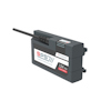 Laddare med texten "SPS Scangrip Power Solution 12V 35W" och en ansluten kabel.