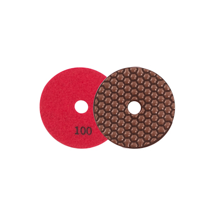 Två polerpads, en röd med texten "100" och en brun med hexagonalt mönster.