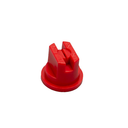 Rött plastmunstycke.