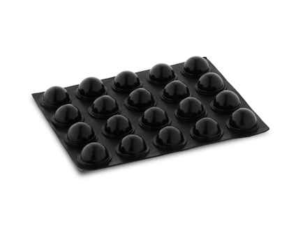 Svarta, halvcirkelformade buffertar i en 4x5-matris på svart ark.