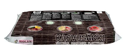 Växtsäck i brun förpackning med illustrationer av grönsaker och text på flera språk. Märkt "Biolan".