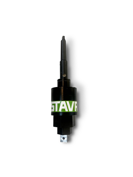 Svart mekanisk komponent med gröna och vita bokstäver "STAVREX" på sidan, i en ljus miljö.