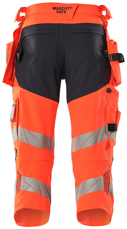 Orange arbetsbyxor med reflexband och fickor, märkt "MASCOT SAFE".