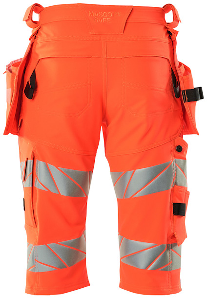 Orange arbetsbyxor med reflexdetaljer och flera fickor.
