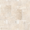 Ljusbeige granitkeramik med varierande textur och mönster.
