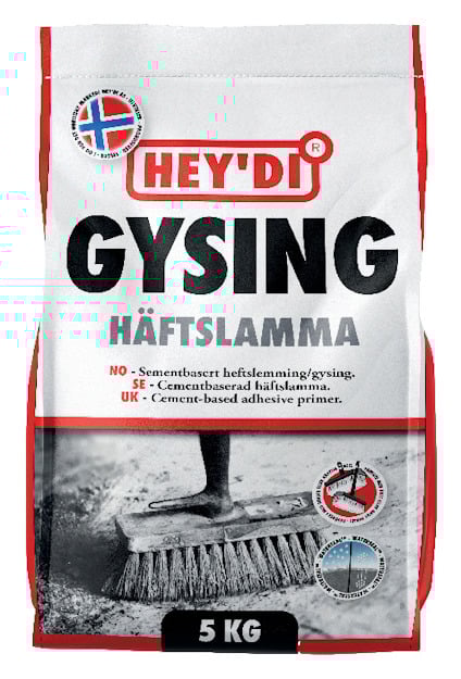 Förpackning med texten "HEY'DI GYSING HÄFTSLAMMA 5 KG" samt symbol och text på norska, svenska och engelska.