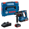 Borrhammare med blå förvaringslåda, batterier och laddare. Märkt "BOSCH" i rött.