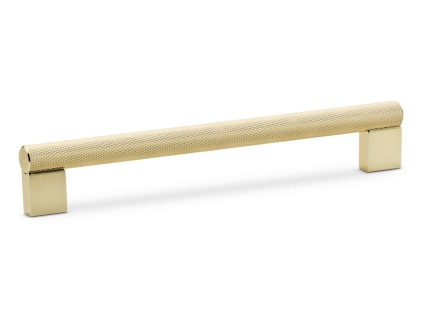 Guldfärgat lådhandtag med strukturerad yta och rektangulära ändar.
