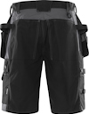 Svarta arbetsshorts med flera fickor och hällor för verktyg. Material i olika texturer och sömmar i kontrasterande färg.