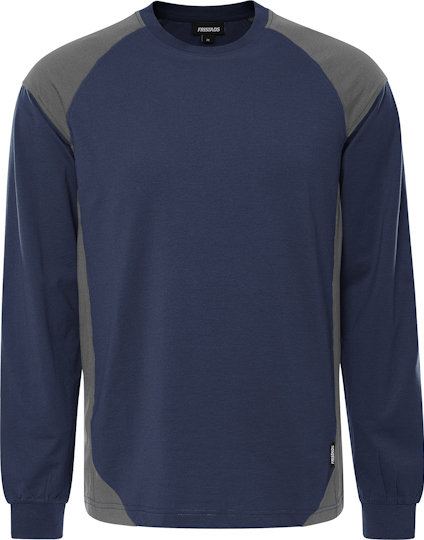 Marinblå långärmad t-shirt med grå axelpartier och sidosömmar. Rund halsringning och elastiska ärmslut.