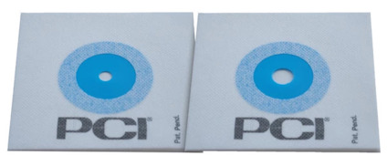 Två fyrkantiga vita plattor med blå cirklar, text "PCI" och "Fix Pack".