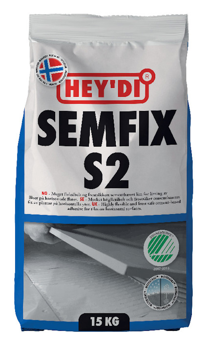 Förpackning av fästmassa Hey'di Semfix S2, 15 kg, med blå och vit design och text på framsidan.