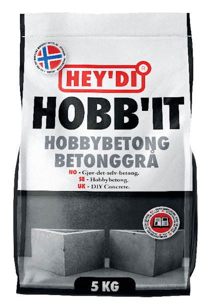 Förpackning av Hey'di Hobb'it hobbybetong 5 kg, med bild på två betongklossar och text på norska, svenska och engelska.