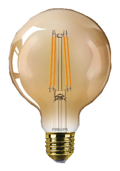 En glödlampa med guldfärgad sockel och filament synliga inuti det genomskinliga glaset.