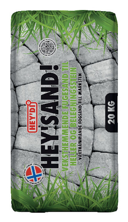 Förpackning med stenar som bakgrund, texten "HEY'SAND! HEY'DI" och "20 KG" samt gräsmönster i hörnen.
